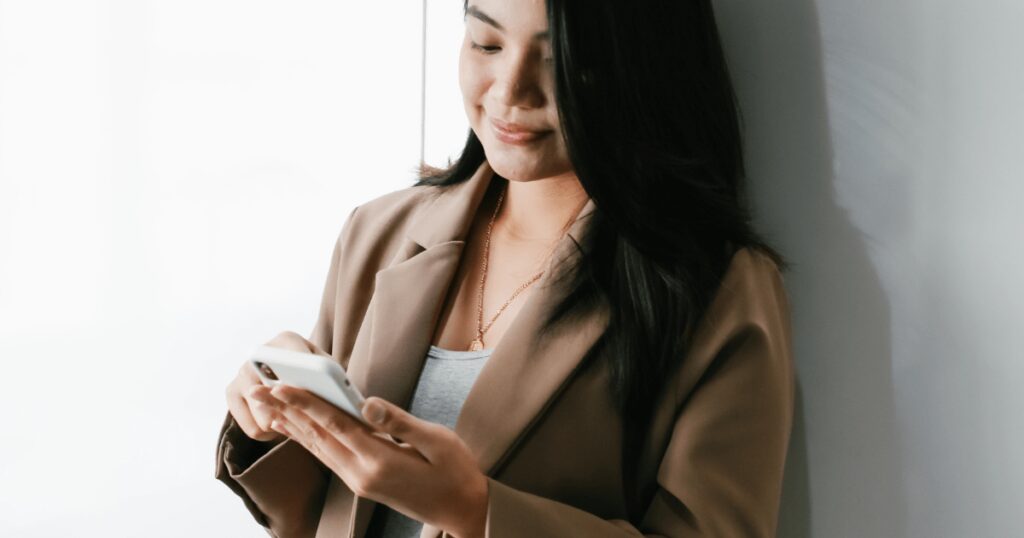 Indonesian girl chatting on phone