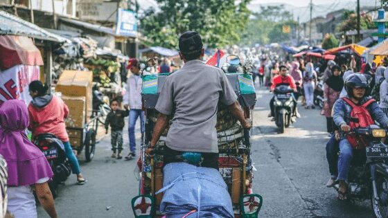 An indonesian man in cart