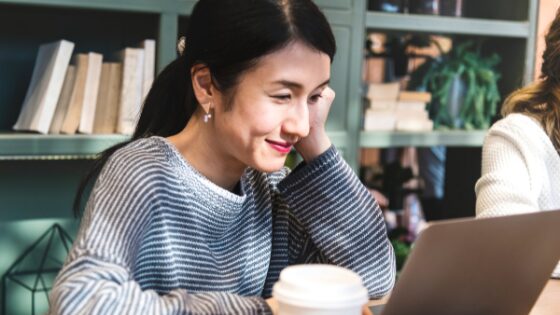Asian woman typing