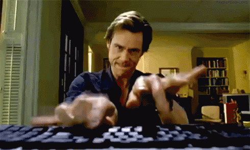 Man typing on keyboard