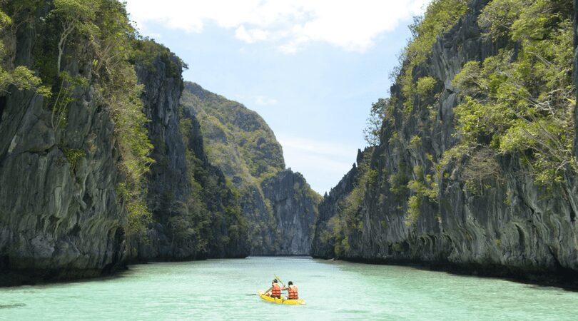 Two people kayaking in Palawan